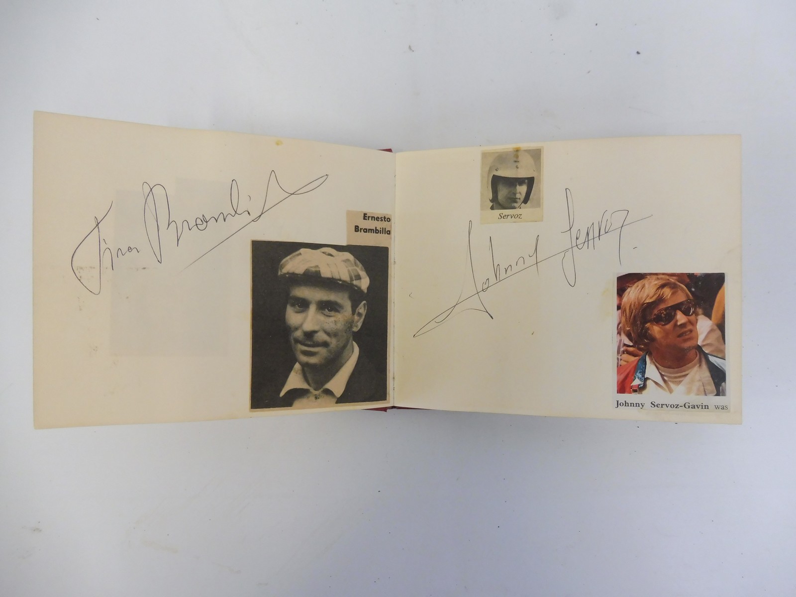 Two autograph albums containing an assortment of racing driver signatures including Jim Clark, - Image 11 of 12