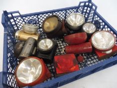 A tray of bicycle lamps.