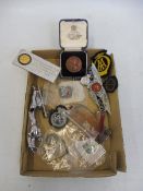A tray of assorted lapel and cloth badges including a cased Motor Cycling Club medal presented for