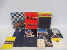 Three Ferrari year books: 1999, 2001 and 2003, still sealed plus various other Ferrari and