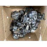 A box of Rover V8 carburettors.
