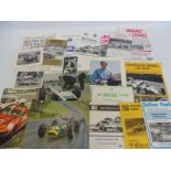 A selection of motor sport related ephemera including signed photographs by Jackie Stewart and Jim