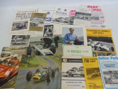 A selection of motor sport related ephemera including signed photographs by Jackie Stewart and Jim