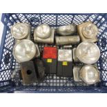 A tray of bicycle lamps.