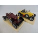 A pair of Carltonware ceramic models, one of a Bull-Nose Morris, the other an MG No.1 1925 (dated