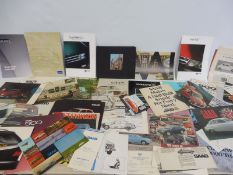 A quantity of Saab and Volvo brochures and leaflets etc.