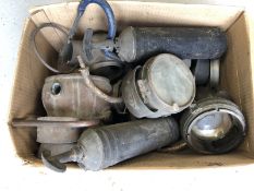 A box of early lamps and parts etc.