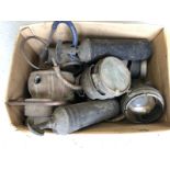 A box of early lamps and parts etc.