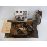 A box of assorted spares including a Bosch wiper motor, interior rear view mirror etc.