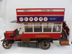 A scale replica model of Beaulieu Motor Museum's open top Edwardian London bus