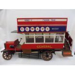 A scale replica model of Beaulieu Motor Museum's open top Edwardian London bus