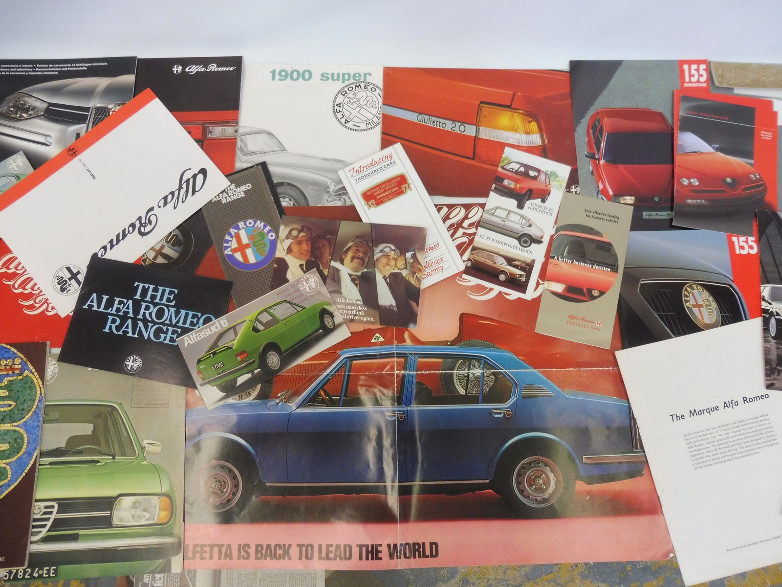 A quantity of Alfa-Romeo brochures featuring various models including the 1900 Super.