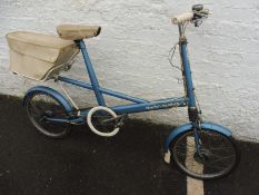 A Moulton Standard bicycle with rear bag.