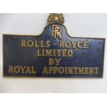 An unusual bronze plaque for 'Rolls-Royce Limited by Royal Appointment' surmounted by a Royal crest,