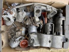 A good box of SU carburettors, plus an early Austin 7 'bacon slicer' starter housing etc.