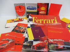 A collection of mixed Ferrari related literature, a poster etc.