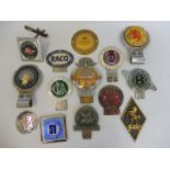 A selection of assorted car badges including Caravan Club, Royal Automobile Club of Queensland etc.