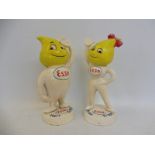 Two reproduction Esso Mr. Drip figures.