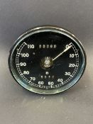 A Bentley 0-110mph black faced speedometer with bevelled glass.