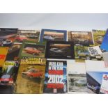 A quantity of Mazda and Mitsubishi brochures etc.