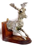 A large stag mascot mounted as a bookend.