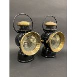 A good pair of Lucas 'King of The Road' No. 721 oil lamps in black enamel with polished brass rims.