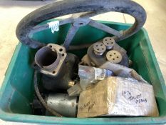 A box of Jowett parts including two cylinders, new pistons, steering wheel etc.