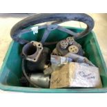 A box of Jowett parts including two cylinders, new pistons, steering wheel etc.