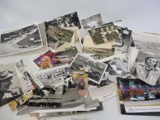 A box of motor racing photographs, some signed.