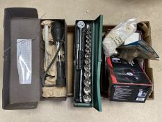 A box of tools including a boxed regulator, an air cutter, a socket set etc.