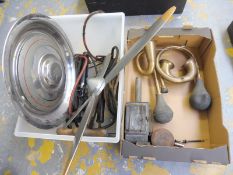 Two boxes of assorted parts including a Rolls-Royce hub cap, brass horns etc.