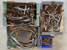 Four trays of vintage car tools.