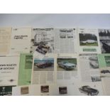 A quantity of Aston Martin brochures and leaflets.