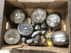 A box of lights and a 0-90mph speedometer, possibly Morris 1000.