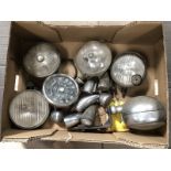 A box of lights and a 0-90mph speedometer, possibly Morris 1000.