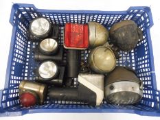 A tray of bicycle lamps.