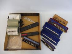 A tray of cased precision instruments including proportional dividers plus three cased Seiko stop