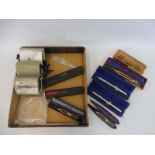 A tray of cased precision instruments including proportional dividers plus three cased Seiko stop