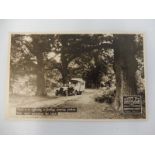 A rare Eccles Caravans pictorial postcard depicting an early vintage car pulling a caravan.