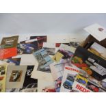A collection of mixed sales brochures and leaflets, including Fiat 132 1980, a Welcome to Dagenham