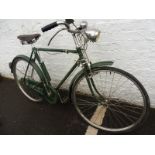 A Raleigh gent's bicycle with Brooks saddle, headlamp etc.