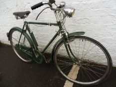A Raleigh gent's bicycle with Brooks saddle, headlamp etc.