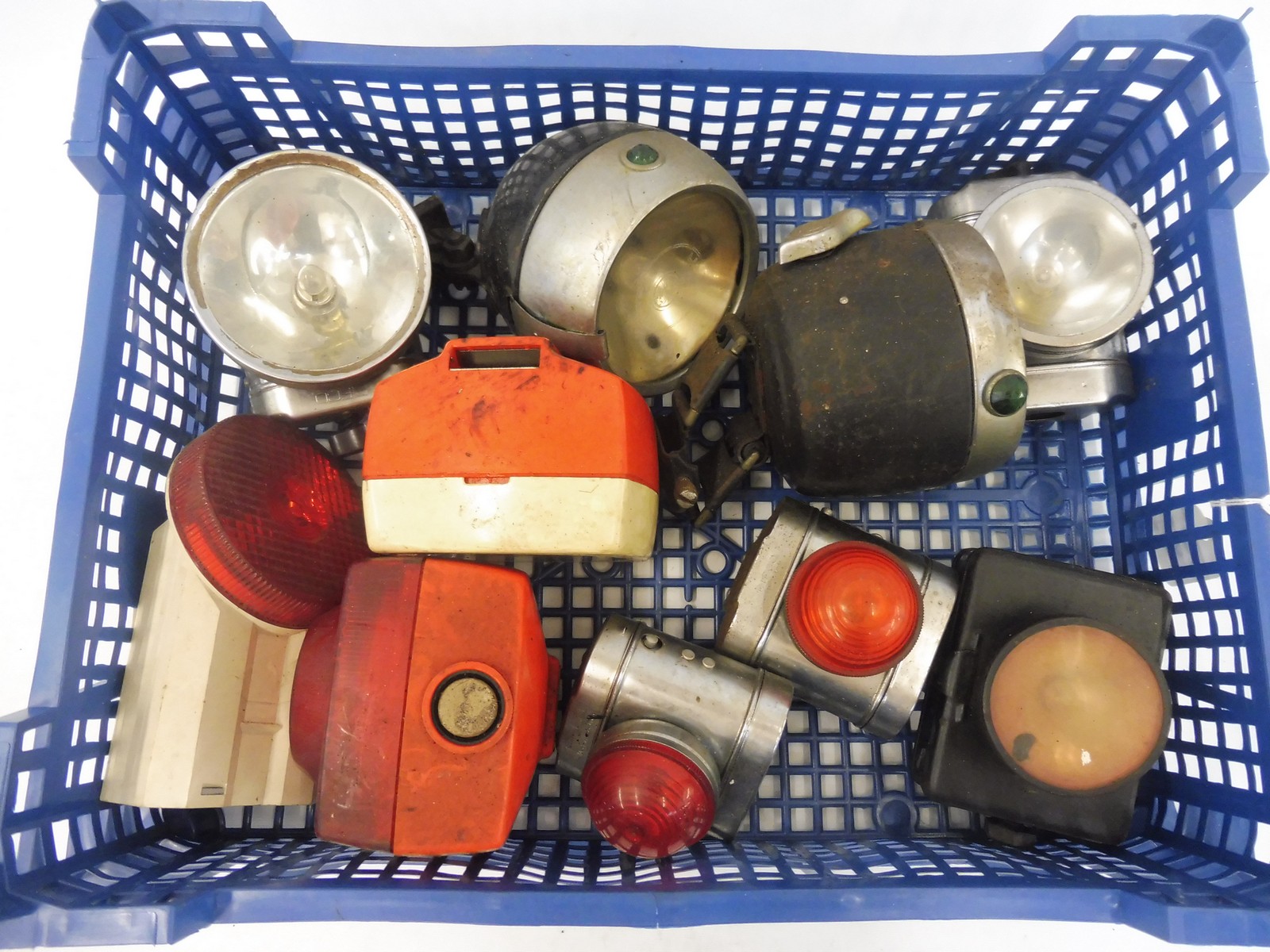 A tray of bicycle lamps.