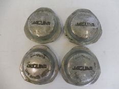 A set of four Jaguar Series II 4.2 hubcaps.