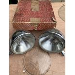 Four headlamp glasses to suit P100s, plus two others and a pair of headlamps.