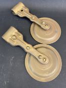 A pair of pressed brass windscreen mounted rear view mirrors.