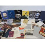 A large quantity of Rolls-Royce brochures and leaflets.