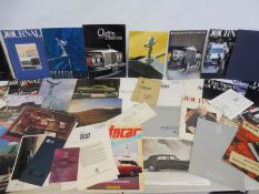 A large quantity of Rolls-Royce brochures and leaflets.