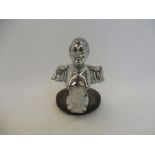An Art Deco accessory car mascot in the form of a semi-winged female nude, head and torso only,