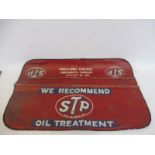 An original STP Oil mechanic's wing cover.